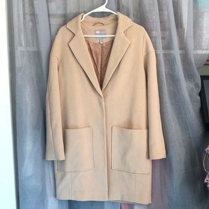 ASOS tan knee-length coat, double layered with buttons and pockets! Size 6.